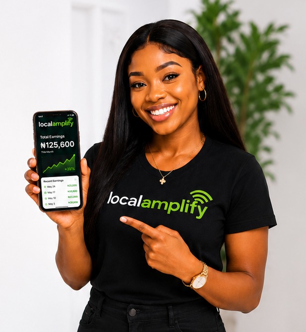 A LocalAmplify amplifier checking referral earnings on a phone